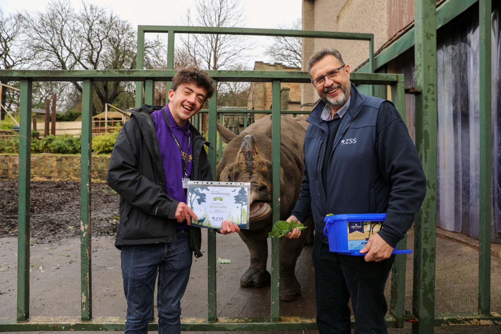 Young Conservationist of the Year 2023 James Cubey on left of RZSS Chief Executive David Field with certificate